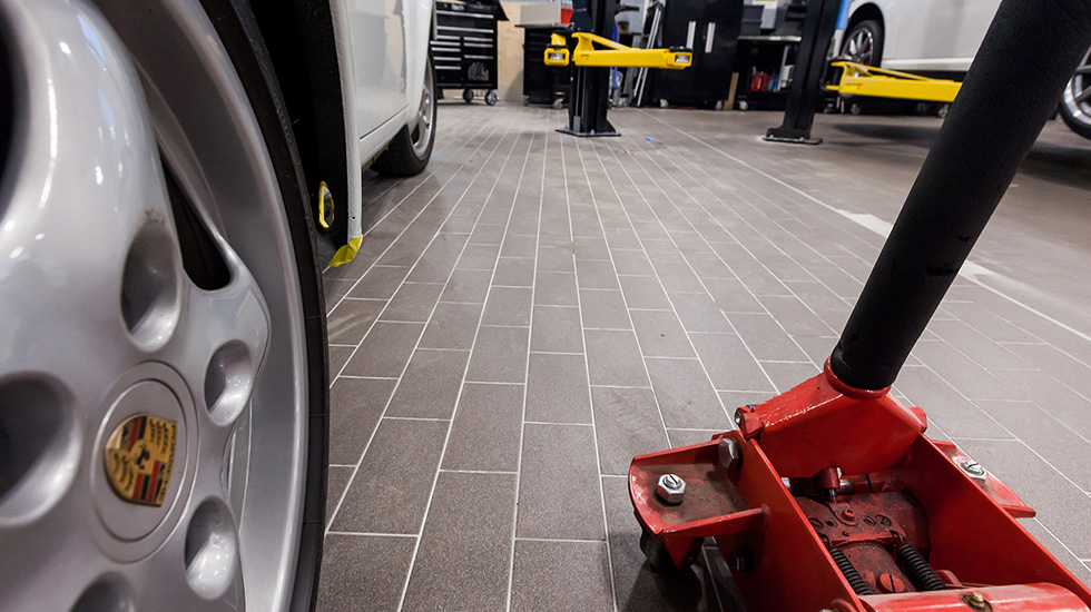 Service area flooring at Porsche auto dealership